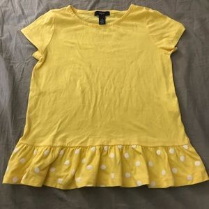 A yellow tee shirt for children.